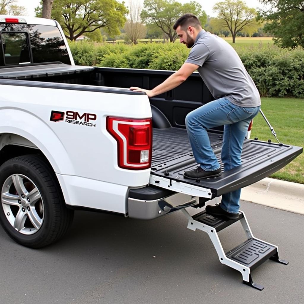 A person using the AMP Research BedStep to access their truck bed