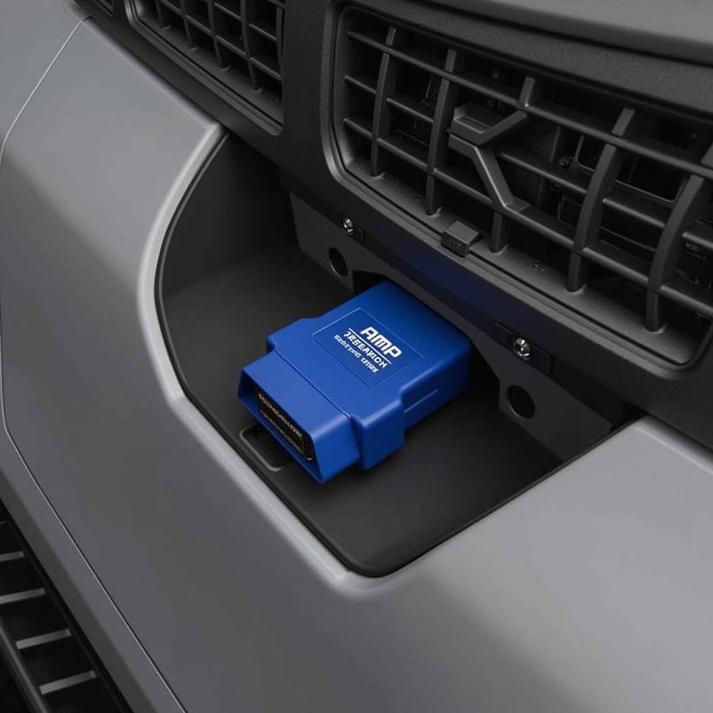 AMP Research OBD2 Plug Connected to a Vehicle