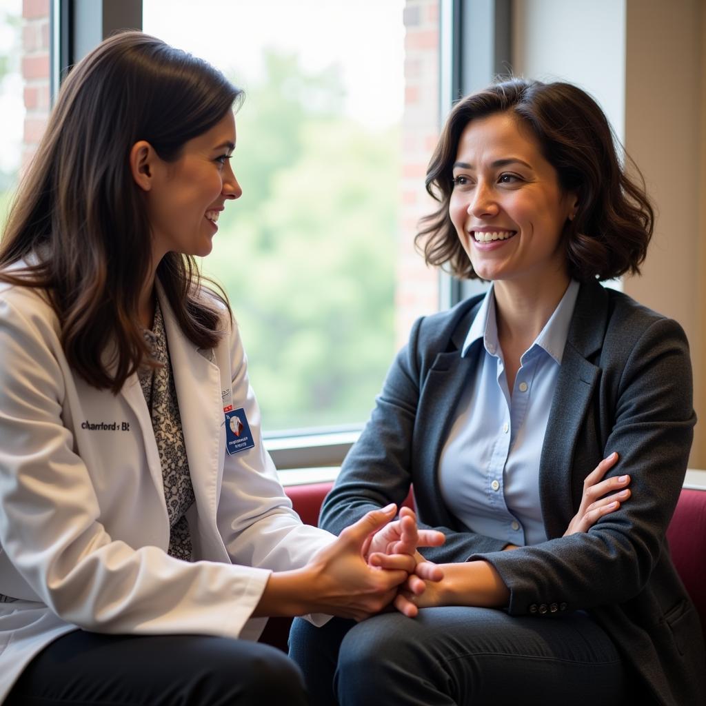 Stanford Clinical Research Coordinator interacting with a patient.