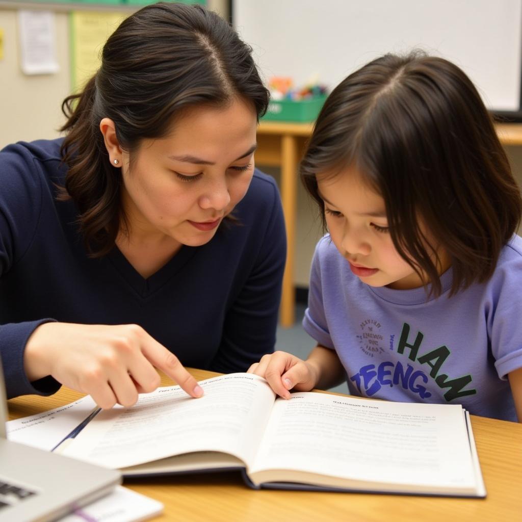 Teacher Providing Reading Support to Student