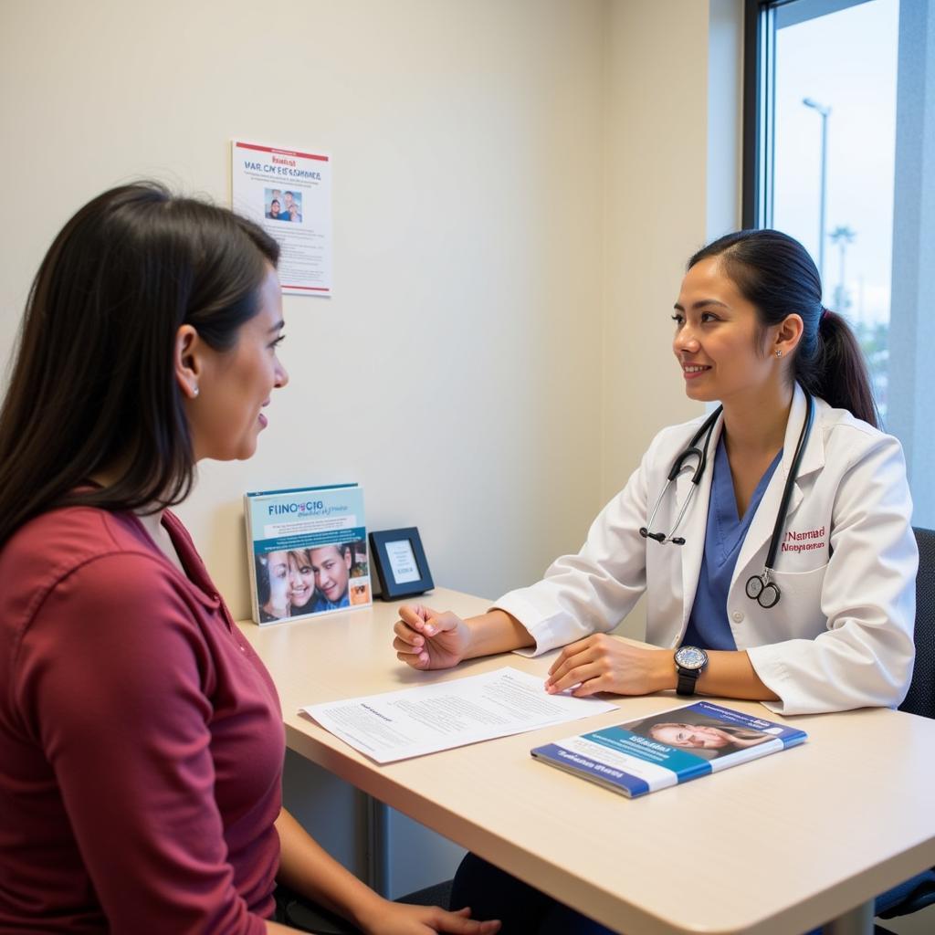 A doctor consults with a patient at the Abramson Family Cancer Research Institute